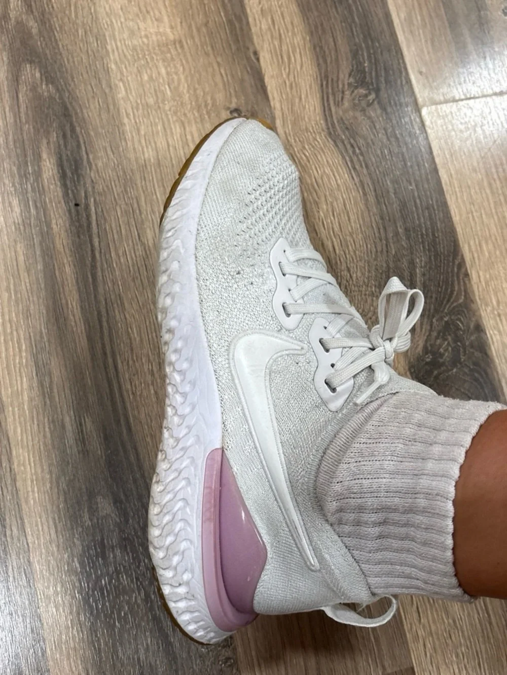 Nike Women's White Knit Sneakers with Pink Heel Accent